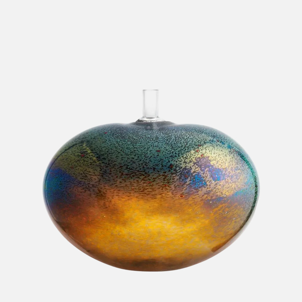Kosta Boda Bean sculpture Decorative glass ornament with multicolored iridescent finish on a white background