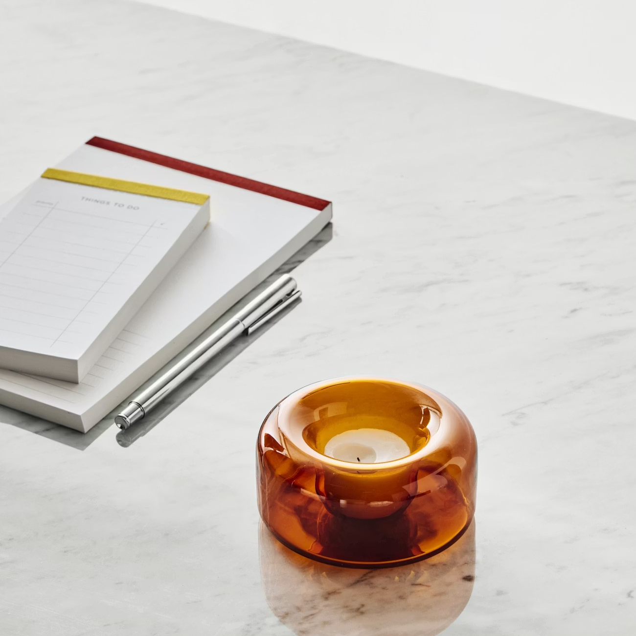 Kosta Boda Happy amber votive