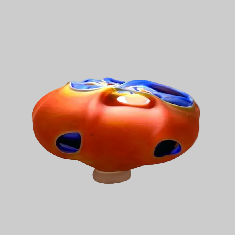 Peter Layton's glass object with blue accents on a white background