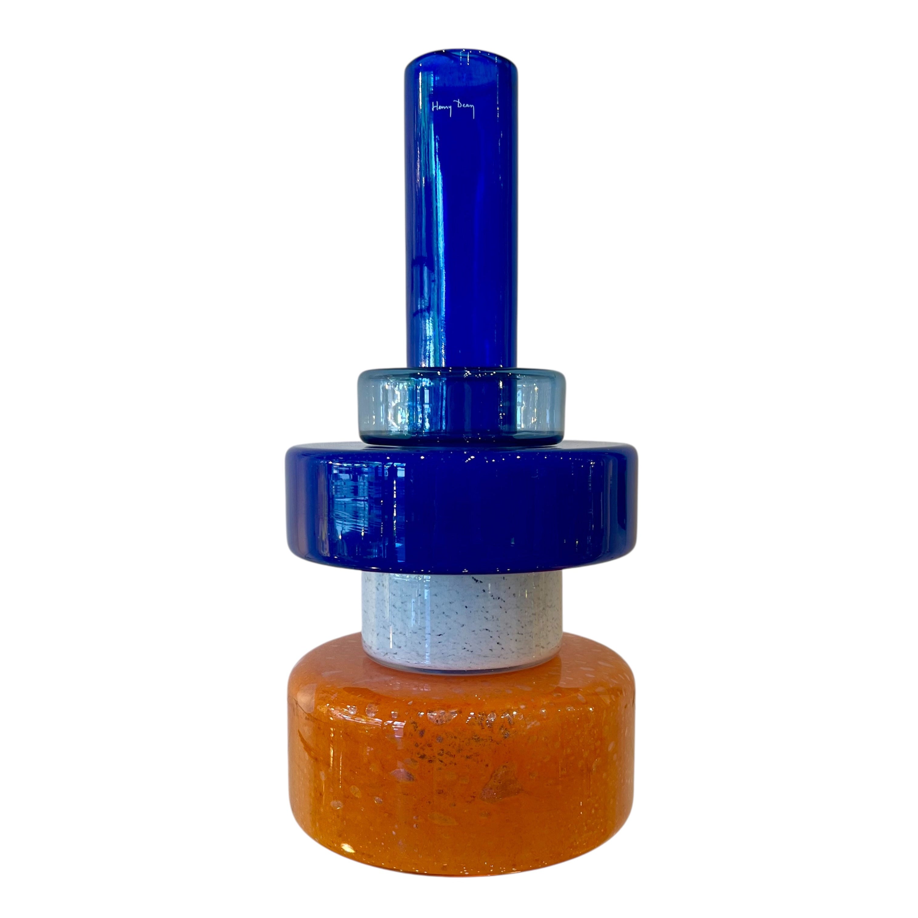 Blue and orange bottle cap on a white background