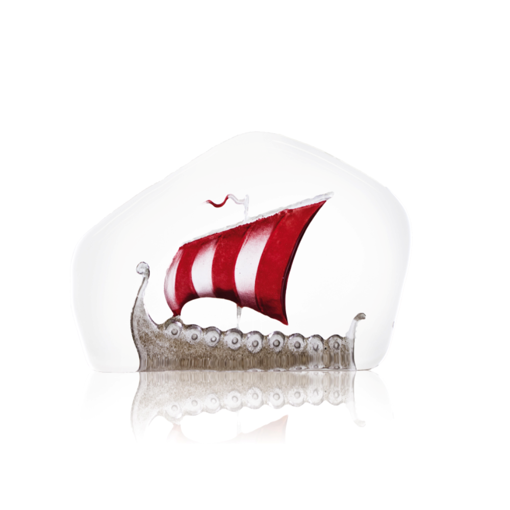 Decorative glass Viking ship with a red sail on a white background