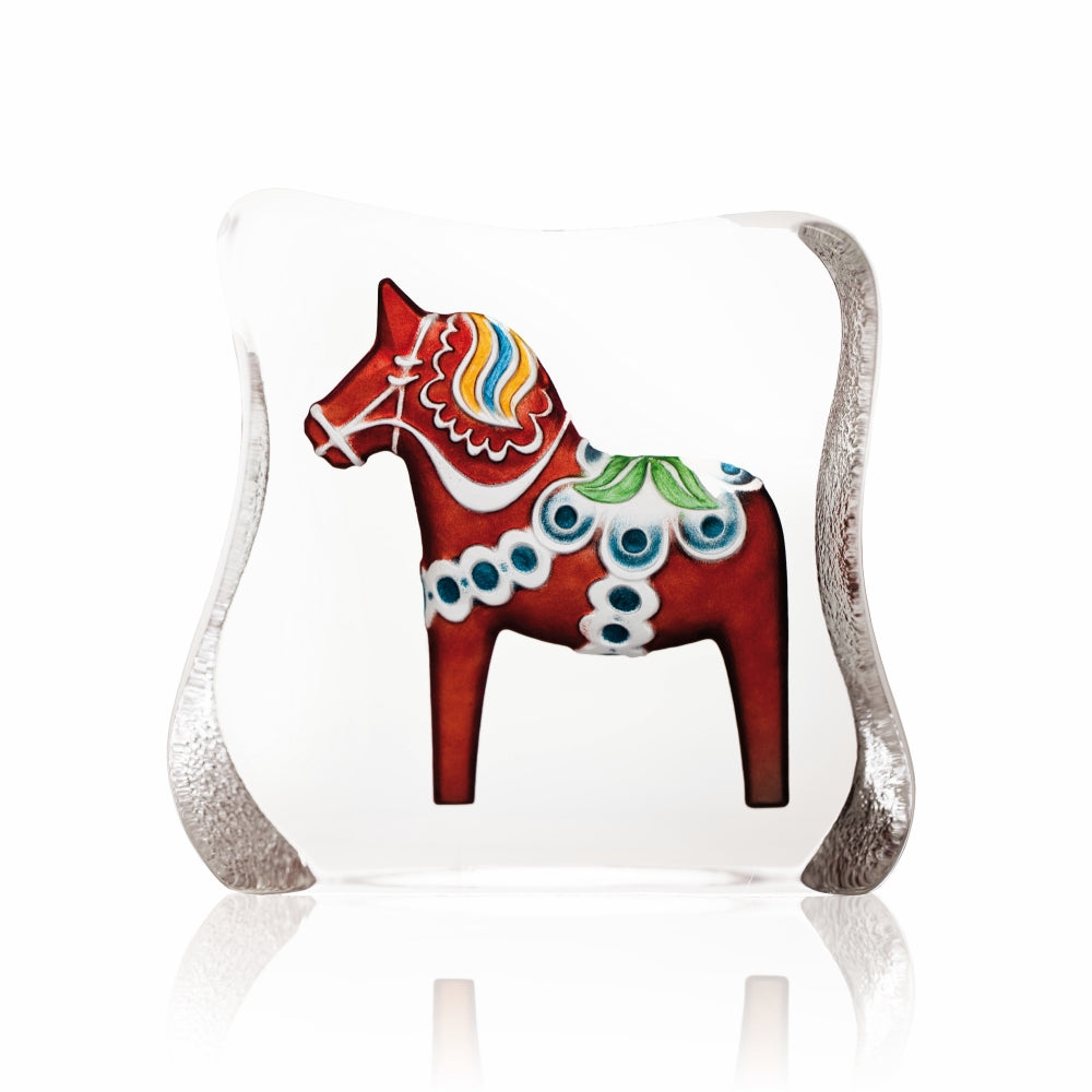 Colorful horse figurine with a white base on a white background