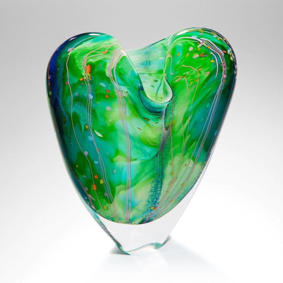 Green glass sculpture on a white background
