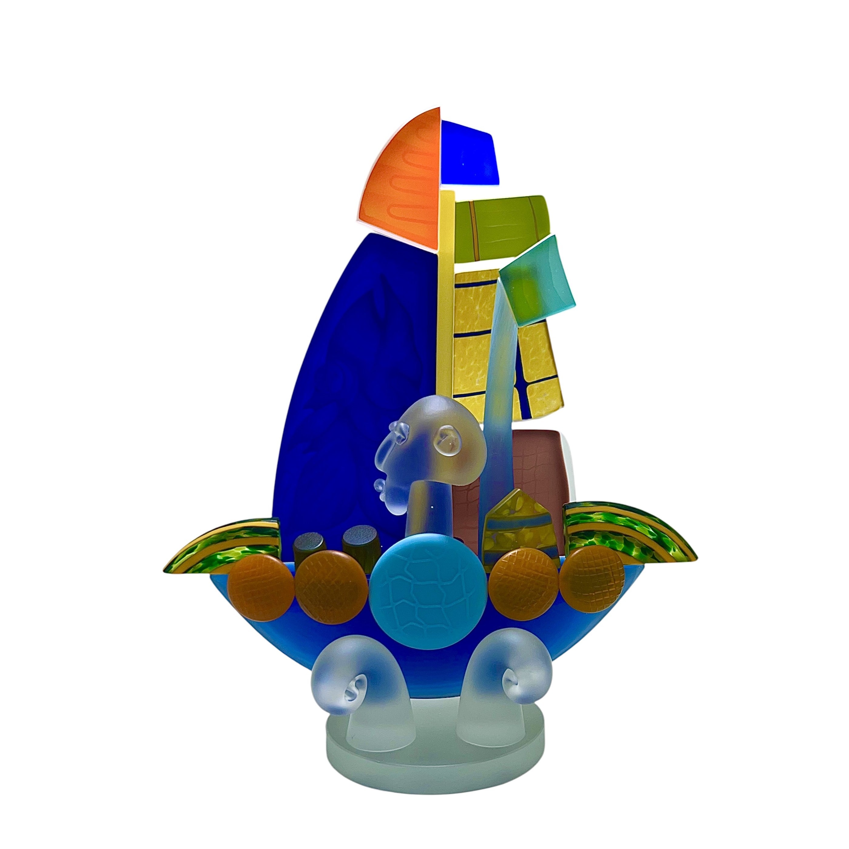 Colorful glass sculpture of a sailboat on a white background
