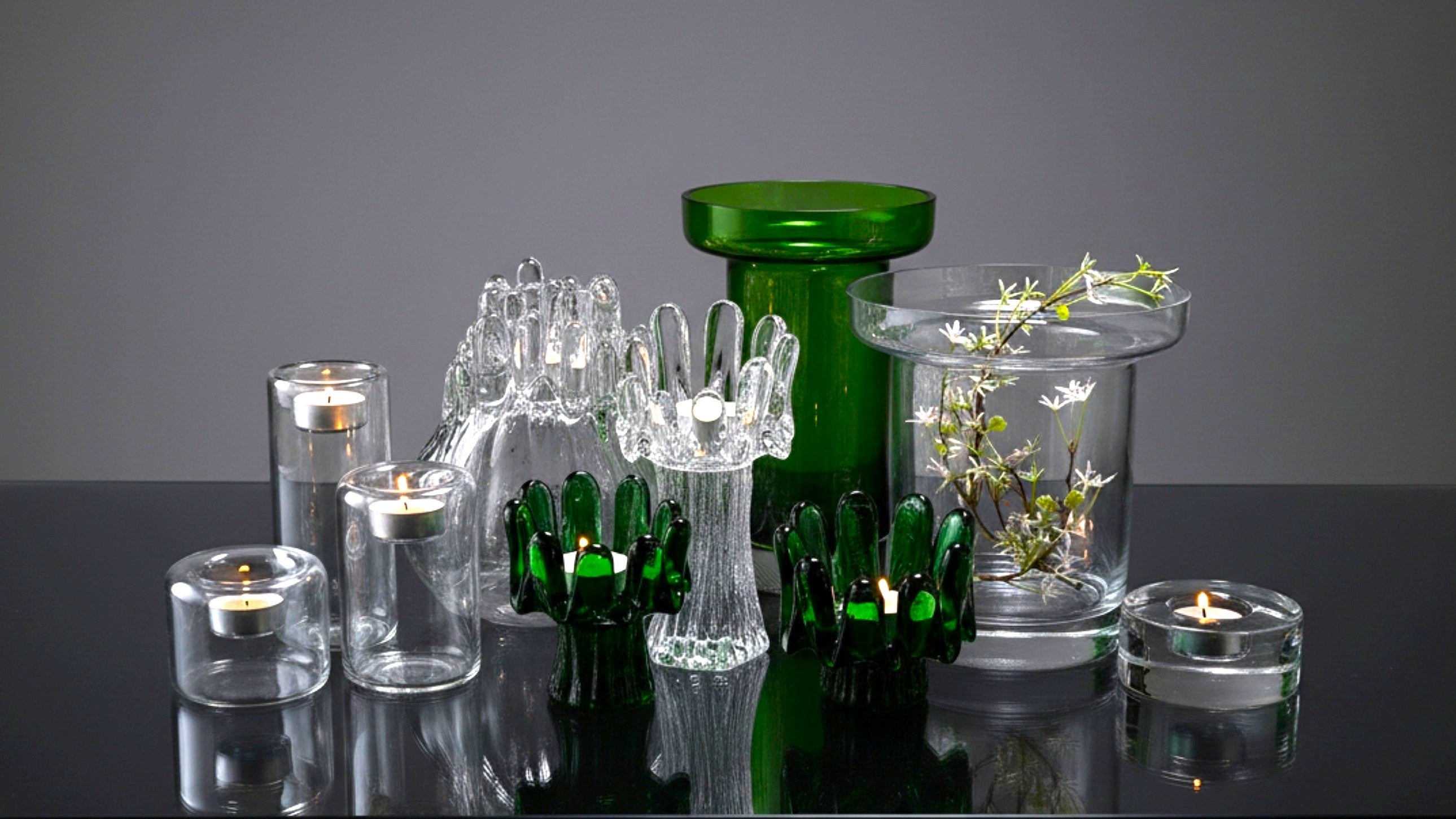 Kosta Boda Swedish glass collection of decorative glass candle holders and vases 