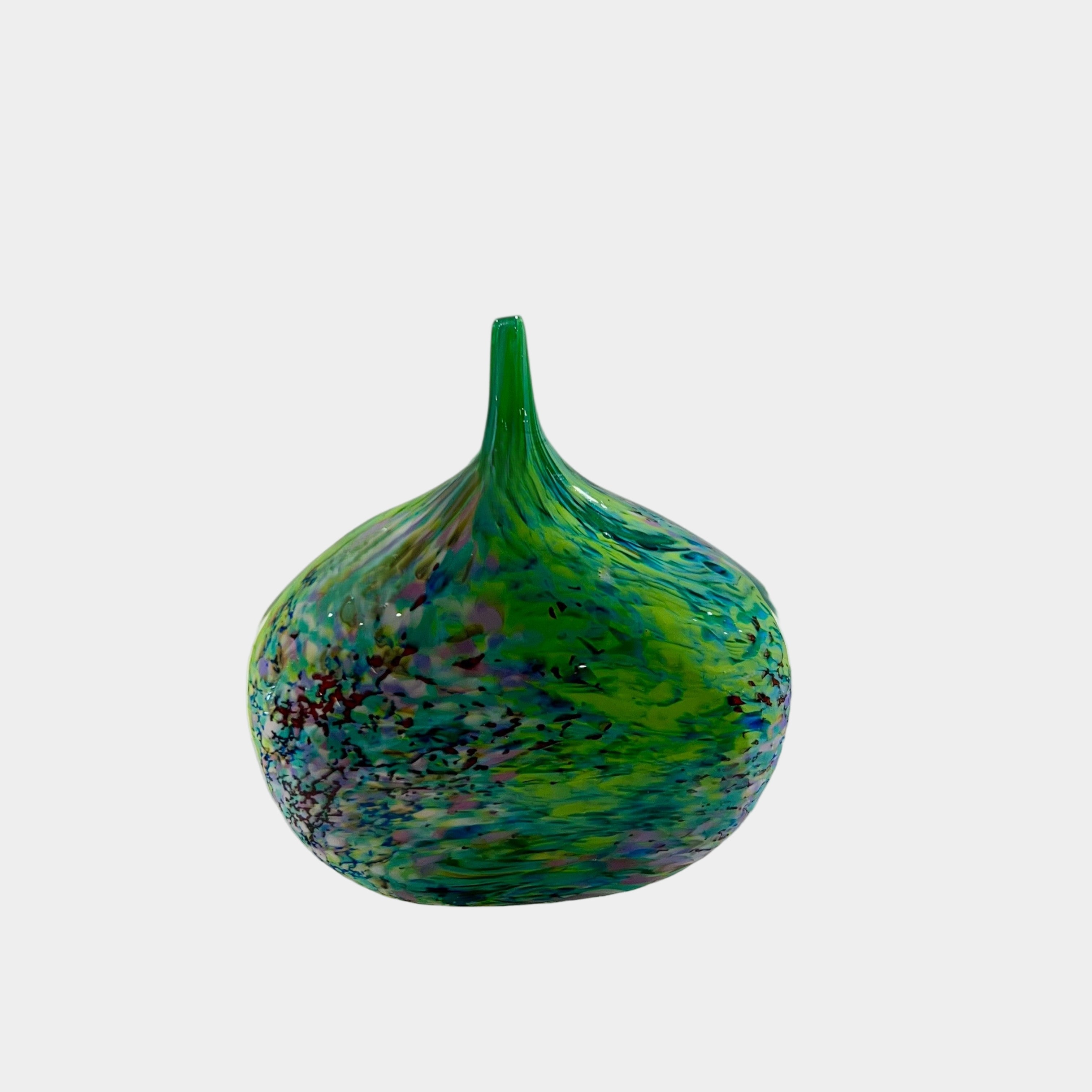Green and blue glass vase on a white background