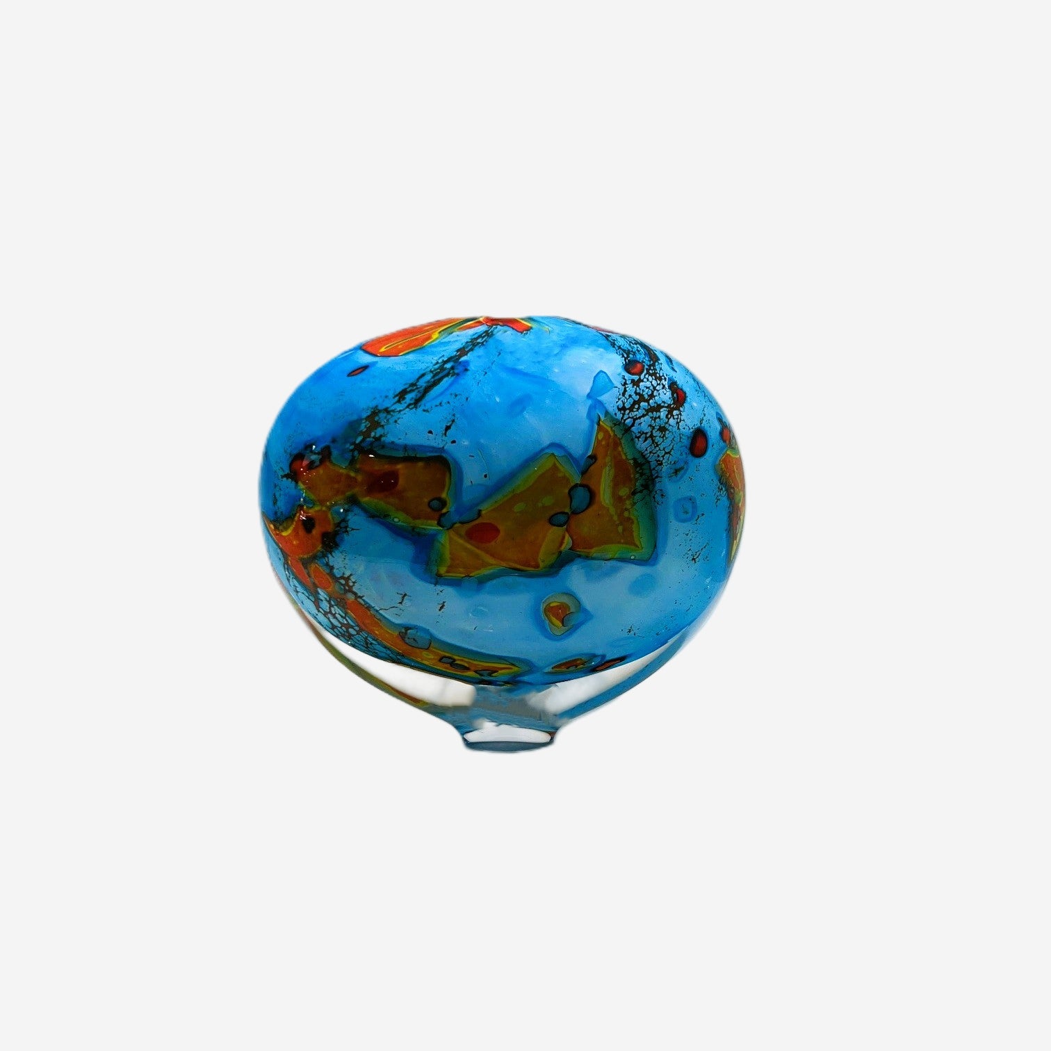 Colorful glass knob with abstract design on a white background
