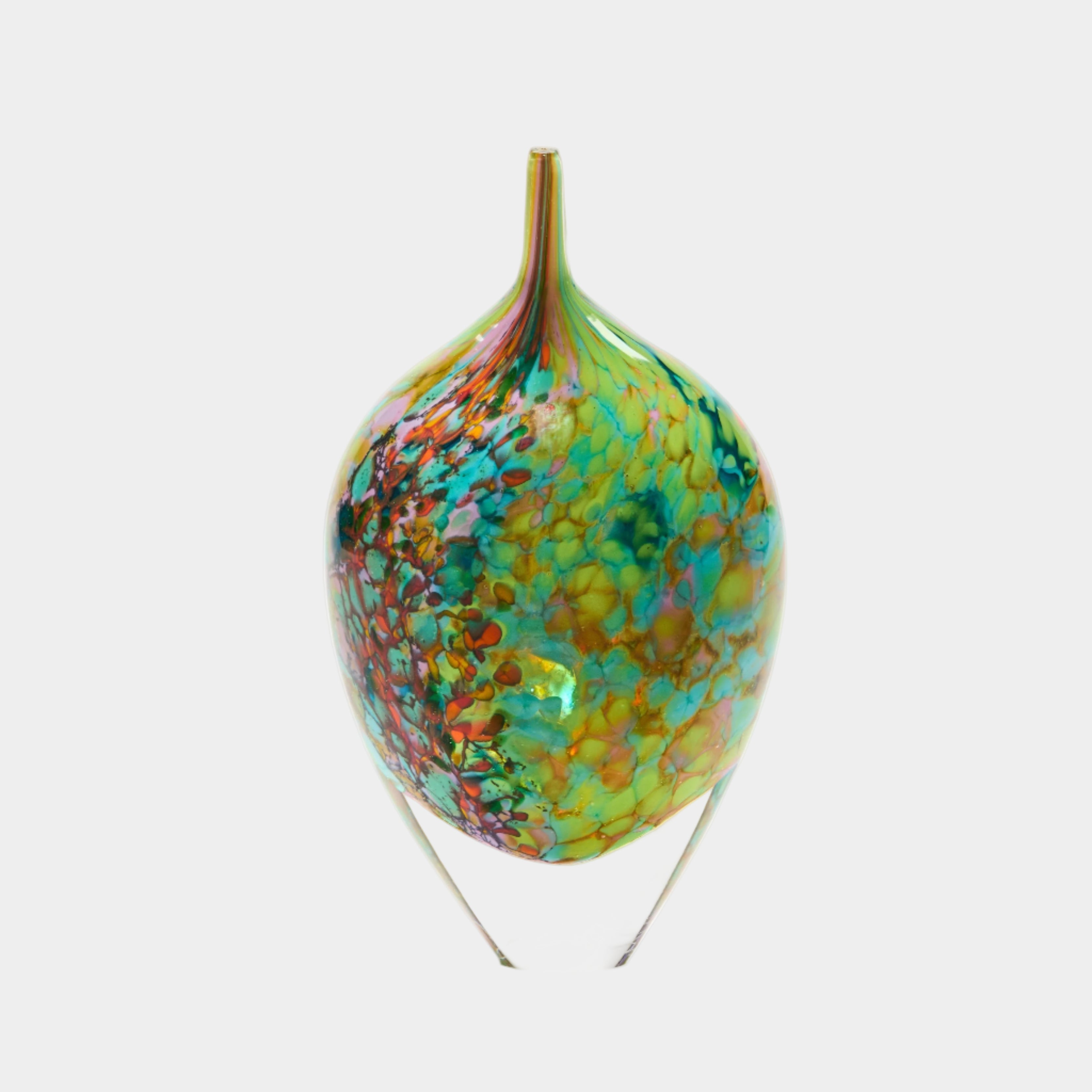 Colourful glass bottle on a white background