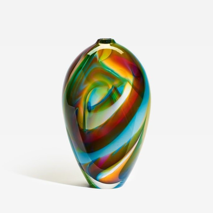 Multicolored glass vase on a white background