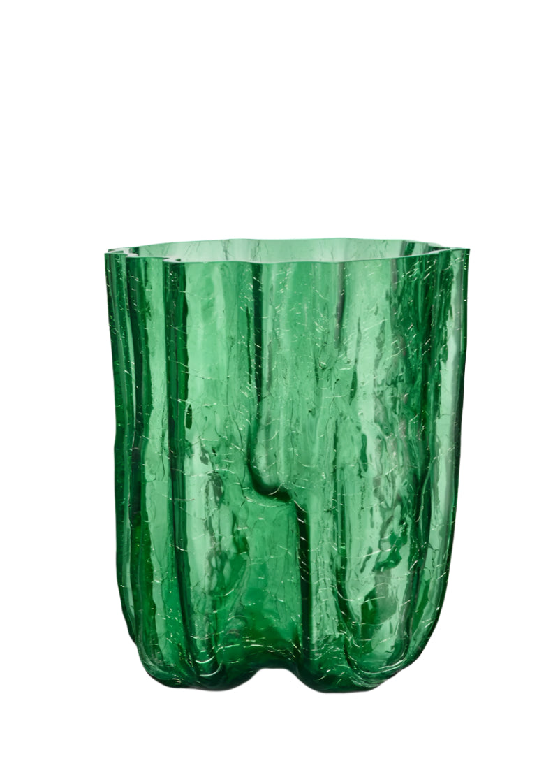 Green glass vase with textured surface on a white background