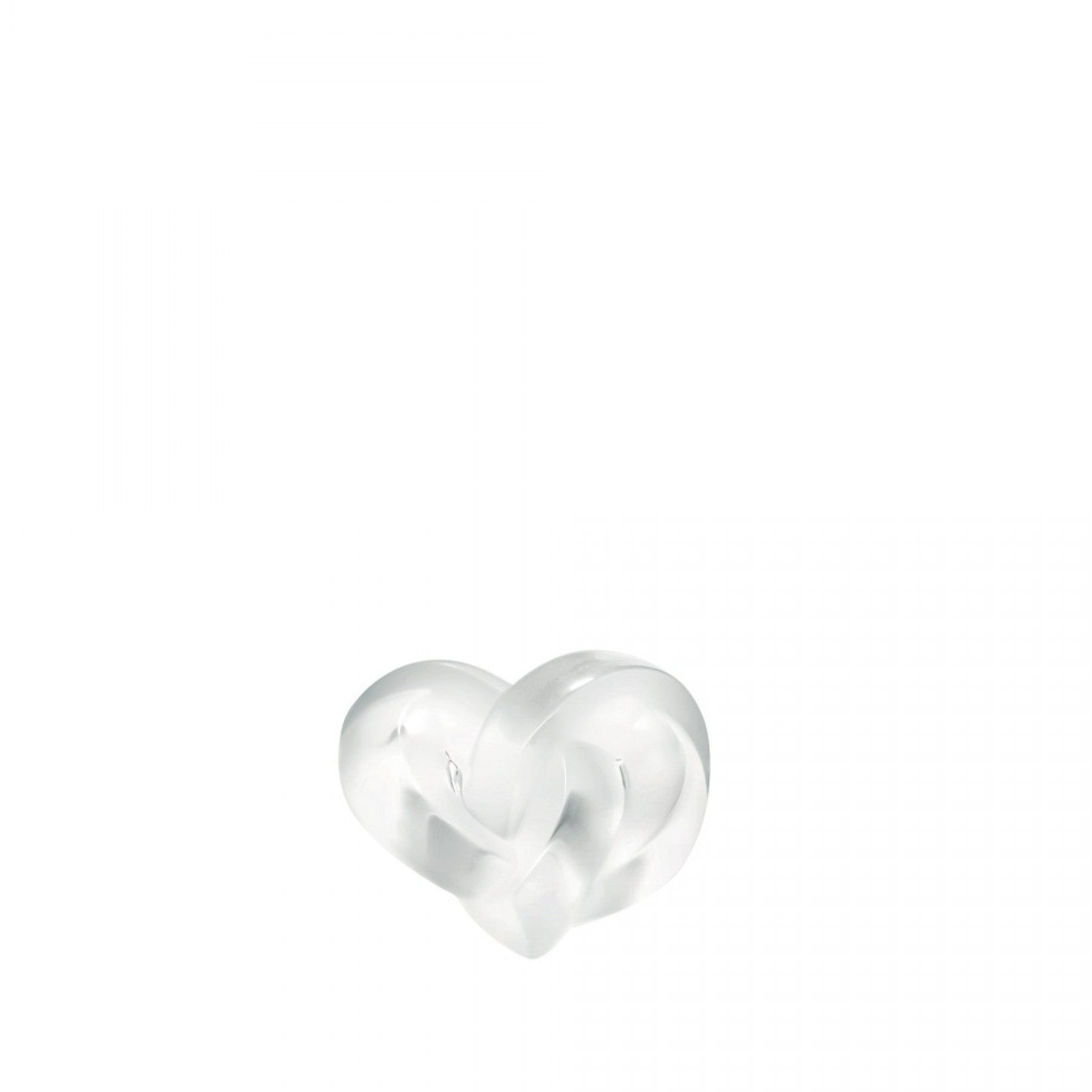 Silver heart-shaped object on a white background